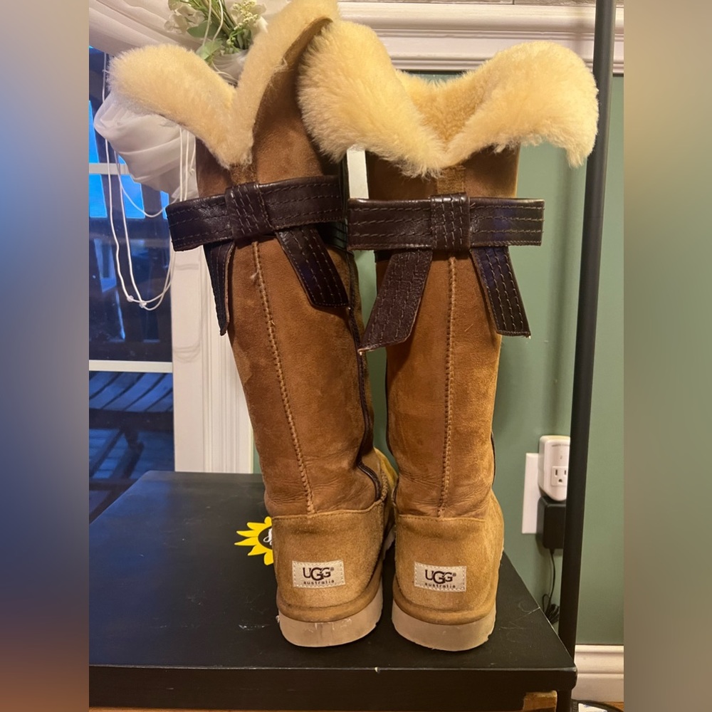Ugg over the knee boots with leather bow. Worn a handful of times. Womens size 9